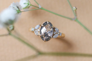 Oval salt and pepper diamond ring