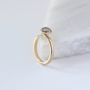Round salt and pepper diamond ring profile view