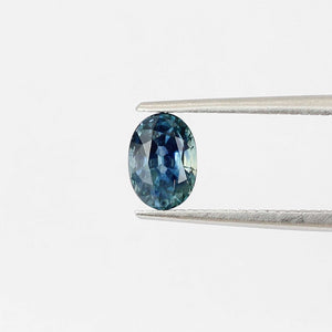 Oval shaped teal sapphire front view