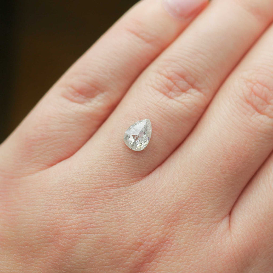 Pear shaped icy salt and pepper diamond