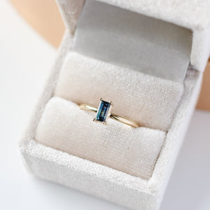Teal blue sapphire ring in rin gbox