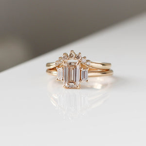 Emerald cut champagne diamond engagement ring with diamond curved band