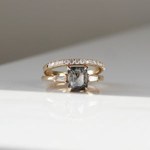 Emerald shape diamond ring with diamond band