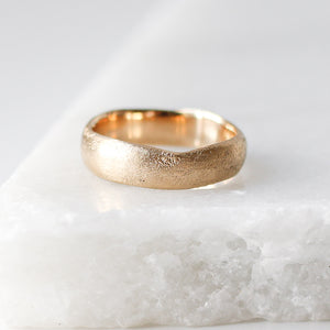 Textured Wide Band in Yellow Gold on marble