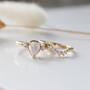 Pear diamond ring and Crown diamond ring set quarter view 