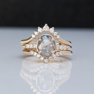Rose cut oval diamond ring paired with 2 diamond gold stacking bands with reflection front detail view