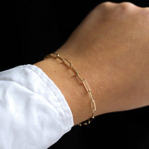 Paper Clip Chain Gold Bracelet worn on hand side view 