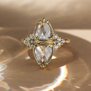 Double Pear Diamond Ring reflecting light