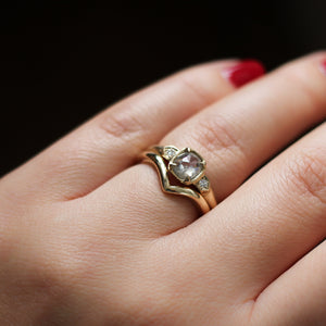 Point Band in Yellow Gold stacked with large diamond ring on hand