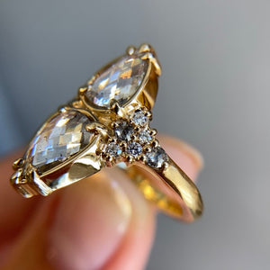 Double Pear Diamond Ring in hand side view 
