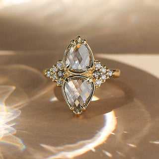 double pear diamond cluster ring in yellow gold