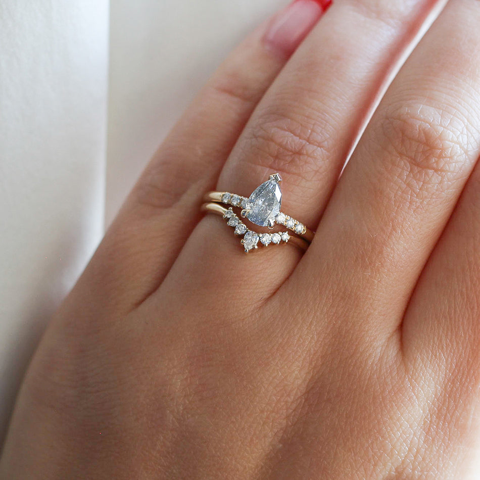 Pear salt and pepper diamond engagement ring