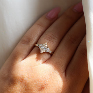 Marquise cut champagne Diamond engagement ring on hand 
