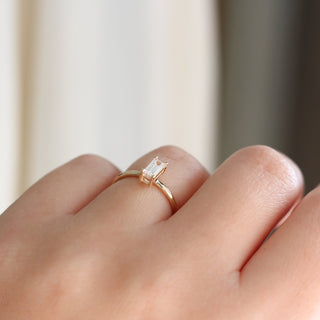 White sapphire ring stacker being worn side view 