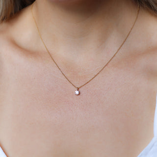 Round Lab Diamond Necklace in yellow gold being worn