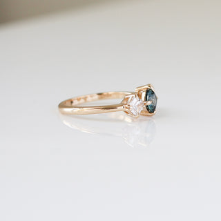 Blue Cushion Cut Montana Sapphire Three Stone Ring side view 