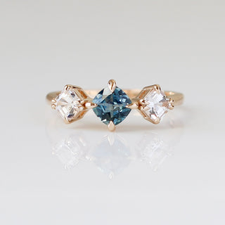 Blue Cushion Cut Montana Sapphire Three Stone Ring front view