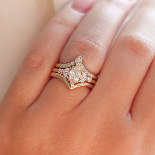 Folia Marquise Cut Champagne Diamond Ring with wave gold band and diamond gold band worn on hand 