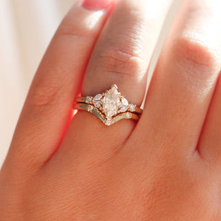 Folia Marquise Cut Champagne Diamond Ring with 3 point diamond gold band worn on hand 