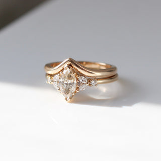 Folia Marquise Cut Champagne Diamond Ring stacked with gold wave band quarter view