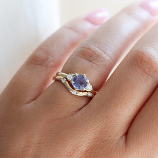 Round Blue Sapphire Ring with 3 point diamond gold band on hand