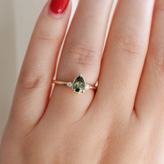  Pear Cut Green Sapphire ring worn on hand front view