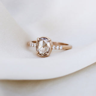 Oval Cut Diamond Ring quarter view on fabric