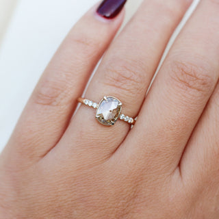 Oval Cut Diamond Ring on hand 