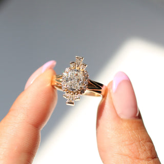 Ballerina Cushion Cut Lab Diamond Ring held in hand in sunlight