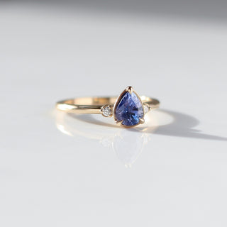 Pear Cut Purple Sapphire ring quarter side view in sunlight