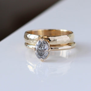 Oval Salt and Pepper Diamond Ring stack on white table