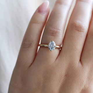Oval Salt and Pepper Diamond Ring on hand close up