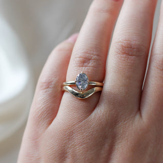 Oval Salt and Pepper Diamond Ring stacked on hand close up 