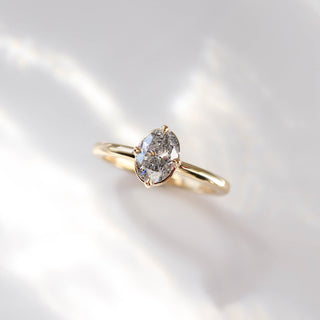 Oval Salt and Pepper Diamond Ring in sunlight