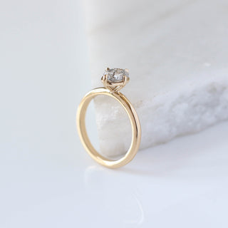 Oval salt and pepper diamond ring profile view