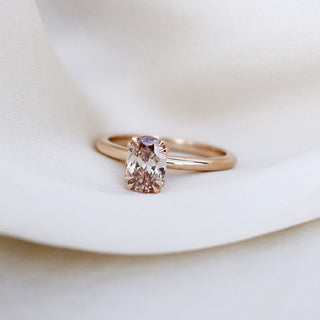 Oval Cut Diamond Ring on fabric