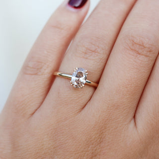 Oval Cut Diamond Ring worn on hand