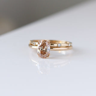 Oval Cut Diamond Ring paired Diamond gold band with reflection