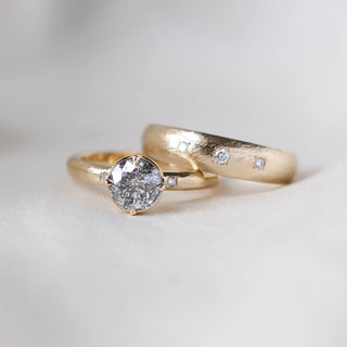 Round salt and pepper diamond ring with wedding band