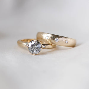 Round salt and pepper diamond ring with wedding band
