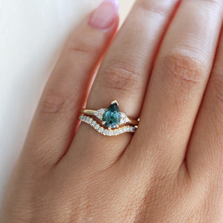 Pear Teal Green Sapphire Ring paired with diamond gold band on hand