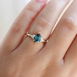 Pear Teal Green Sapphire Ring on hand