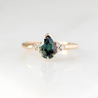 Pear Teal Green Sapphire Ring front view in sunlight
