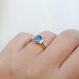 Oval Cut Blue Sapphire Ring on hand side view
