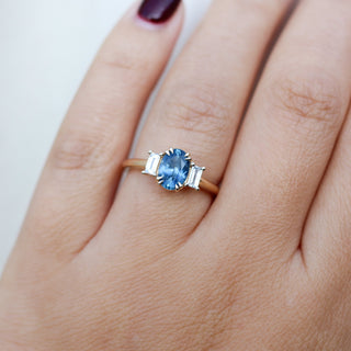 Oval Cut Blue Sapphire Ring on hand