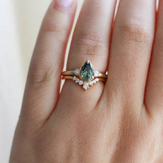 Lagoon Pear Green Sapphire Ring stacked with crown diamond gold band on hand front view