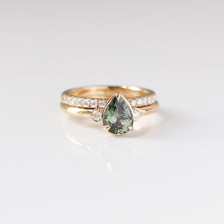 Lagoon Pear Green Sapphire Ring paired with diamond gold band detailed front view
