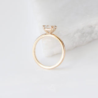 Asscher Cut Sapphire Ring profile view on marble