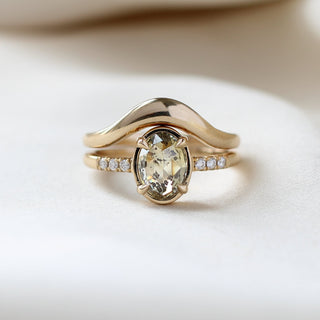  Oval Champagne Salt & Pepper Diamond Ring paired with wave diamond ring