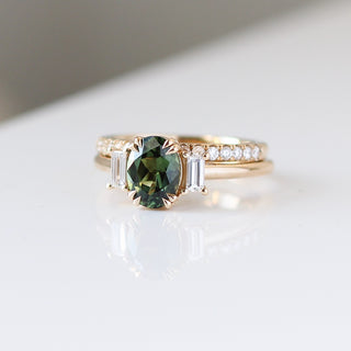 Oval Cut Green Sapphire Ring paired with Diamond Gold Band quarter view